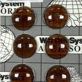 Six round brown topaz glass cabochons placed on a grid background with product labels reading 'No. 25 Sm. Topaz' and 'Jewels Made in Germany'.