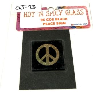 Gold peace sign pendant mounted on a black square display with a bright label reading 'Hot N Spicy Glass'.